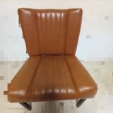 Pair of lounge armchairs, 70s leather