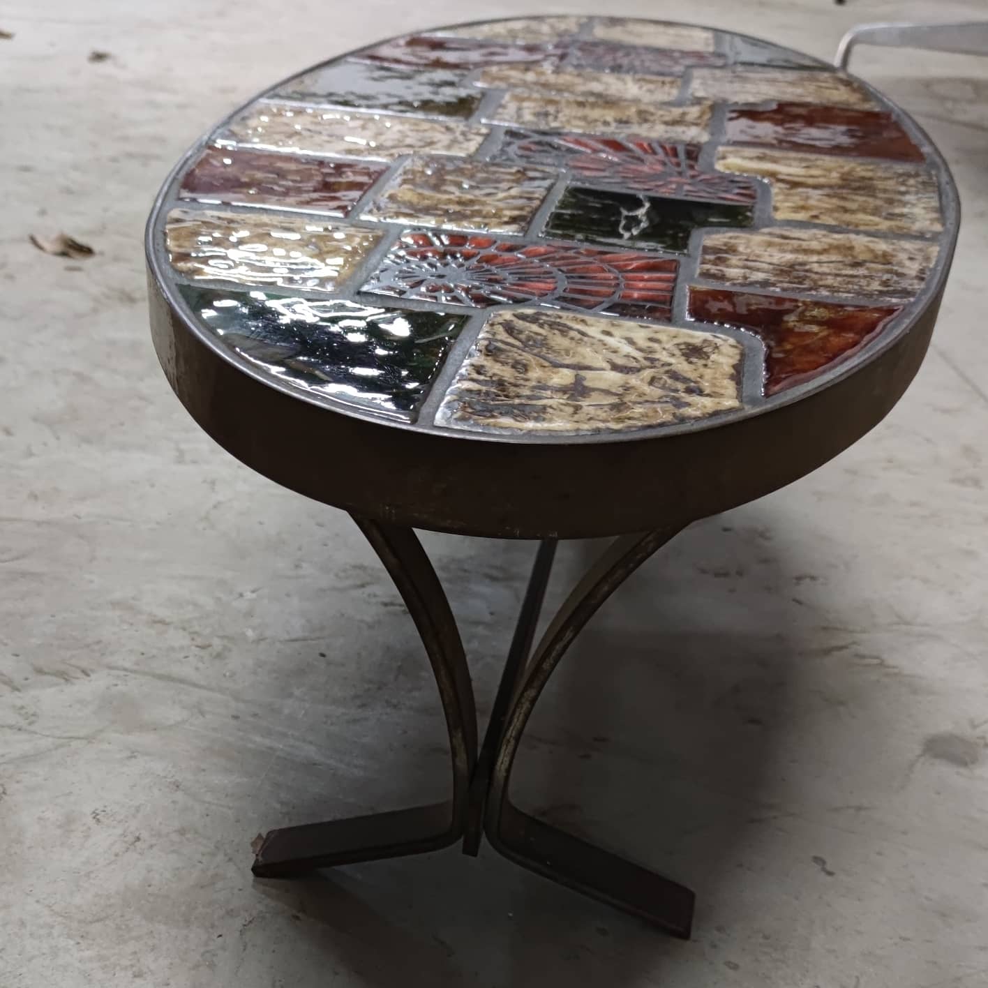 Ceramic and steel elliptical table