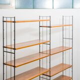 Shelf on feet, black metal ladders, 60s