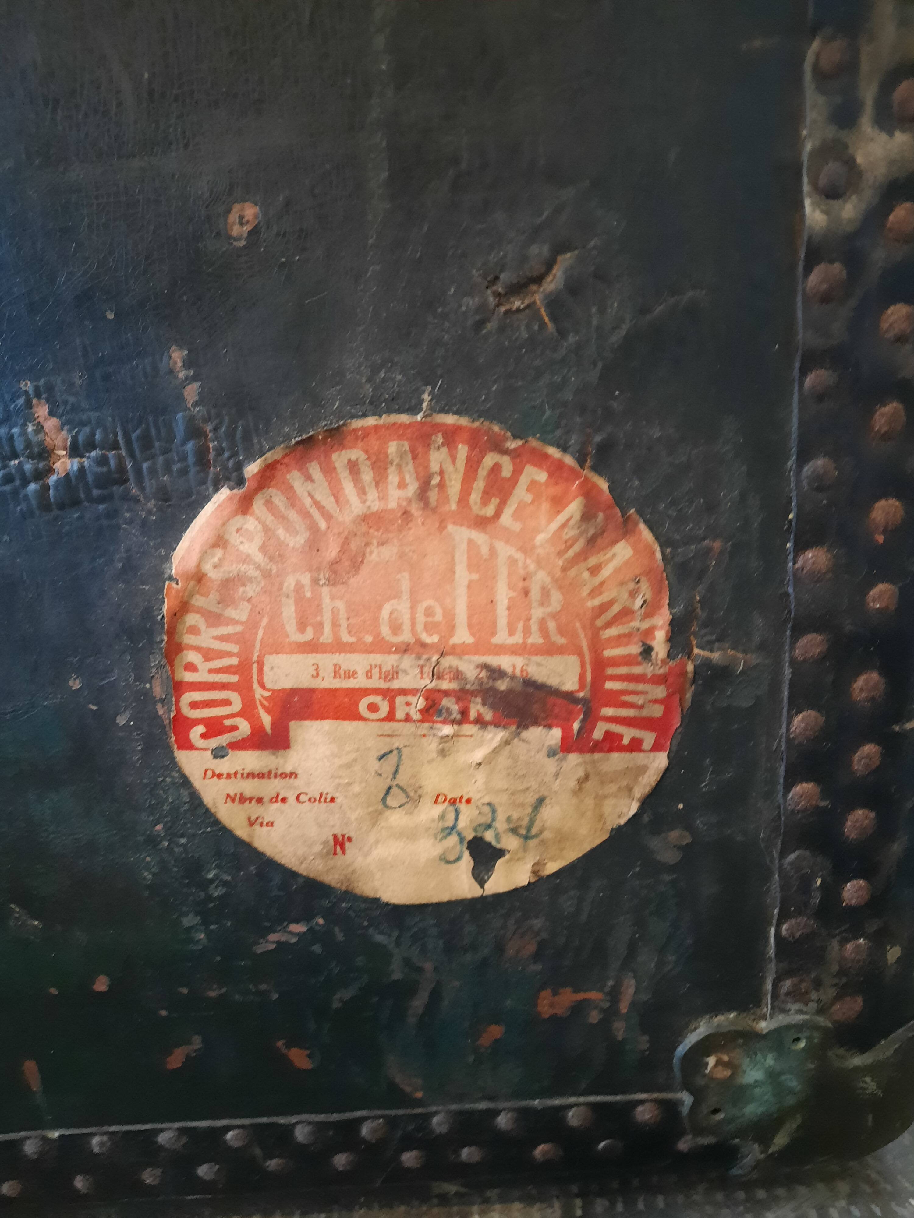 Old and large travel trunk, brass-plated corners