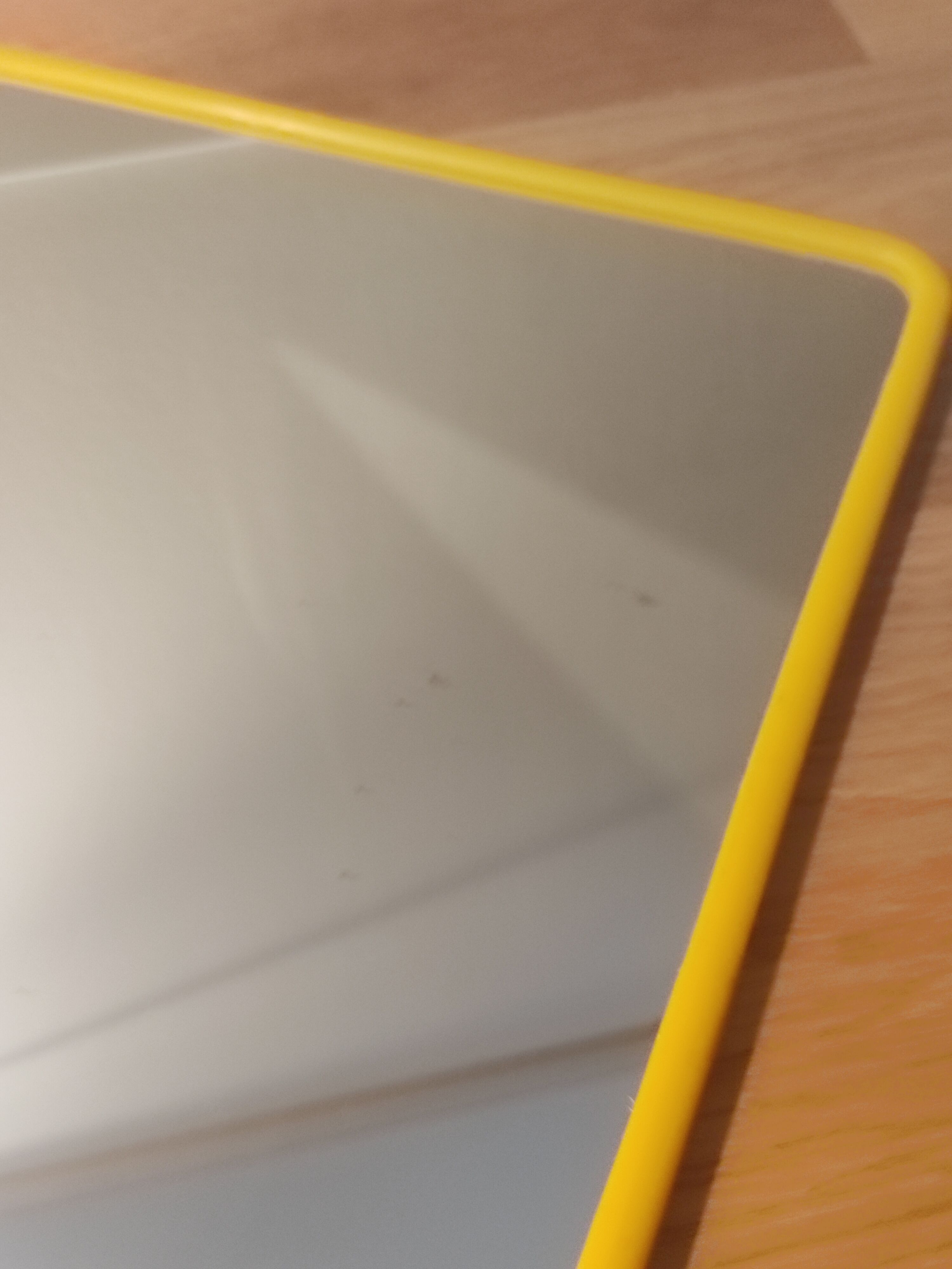 Mirror 70s yellow plastic rounded shape