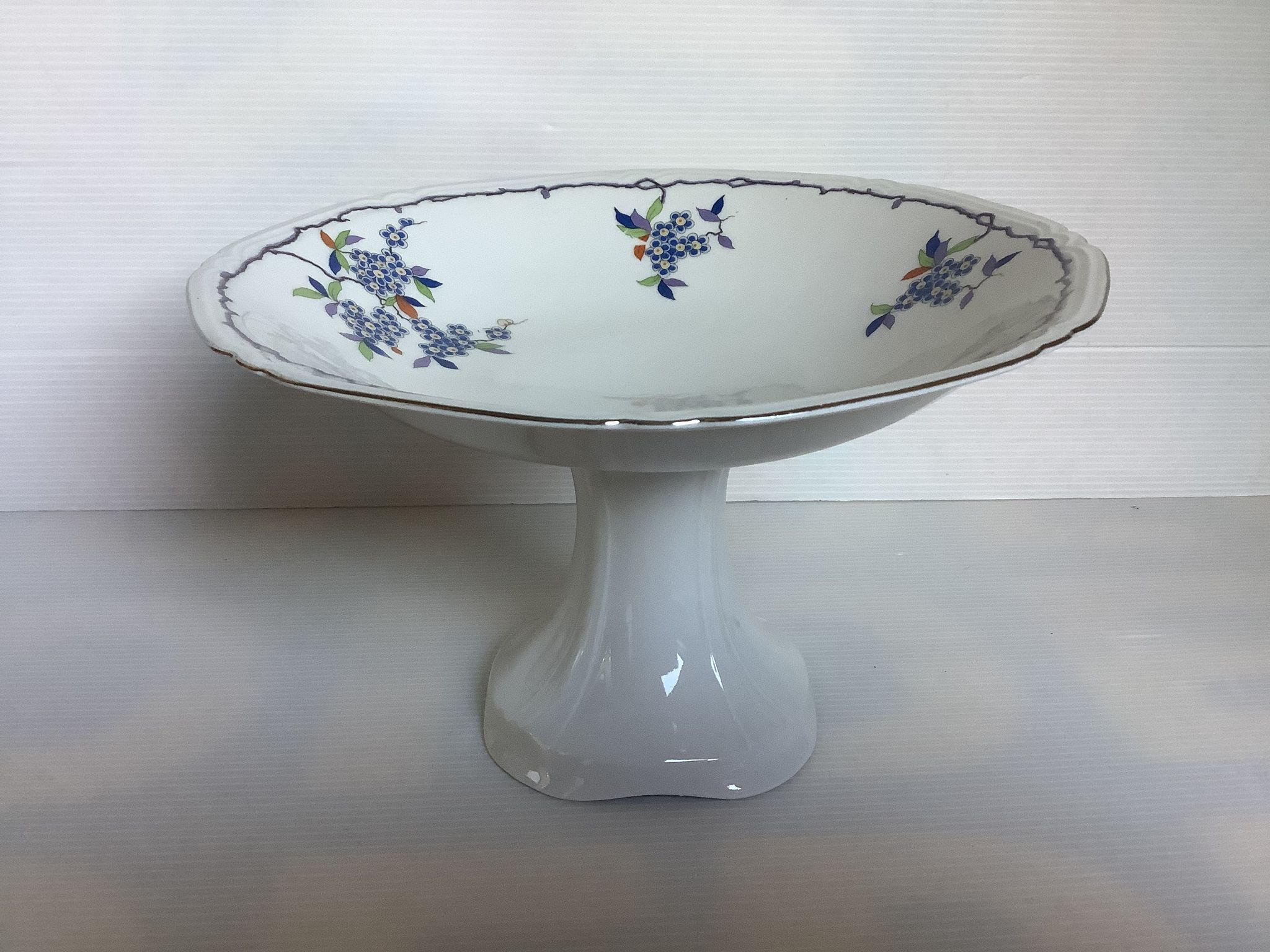Old shower tray with forget-me-not flowers, Czechoslovakia.