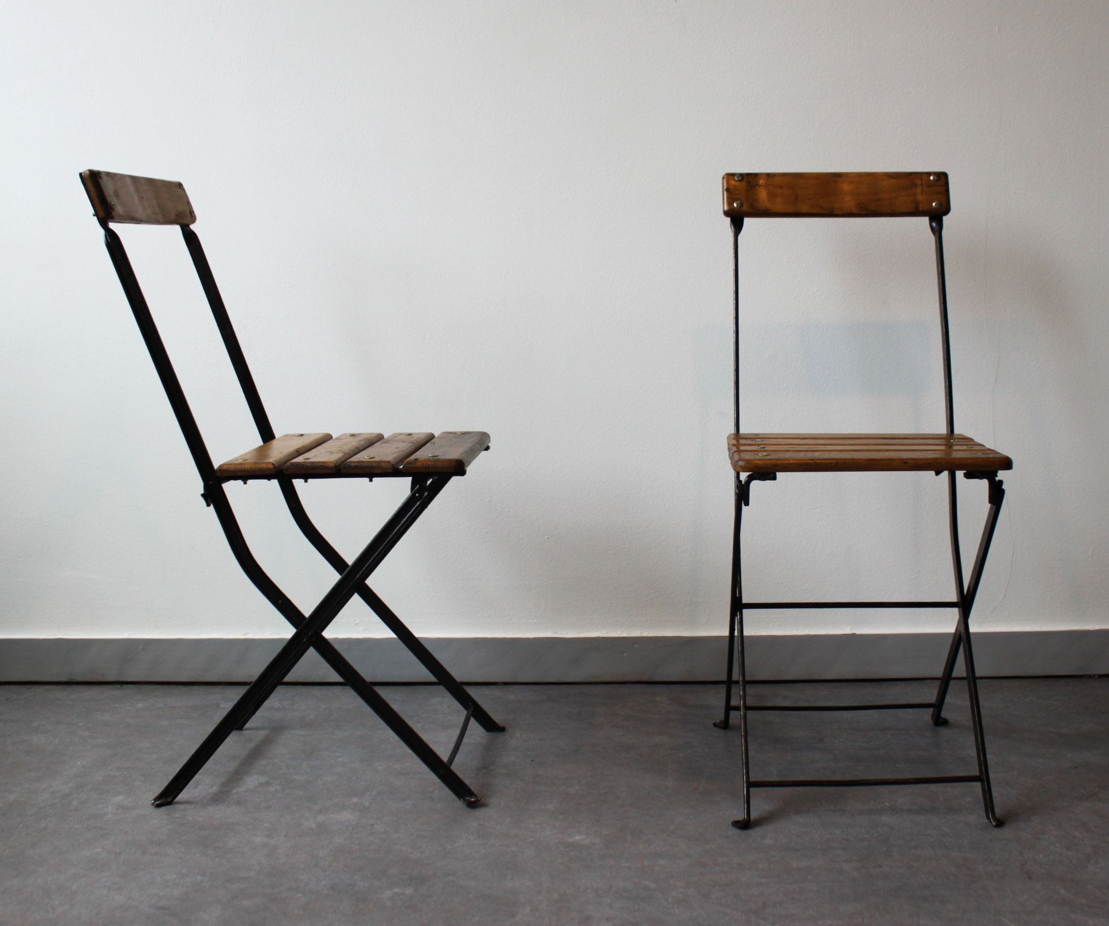 Pair of folding bistro chairs, France, 1930
