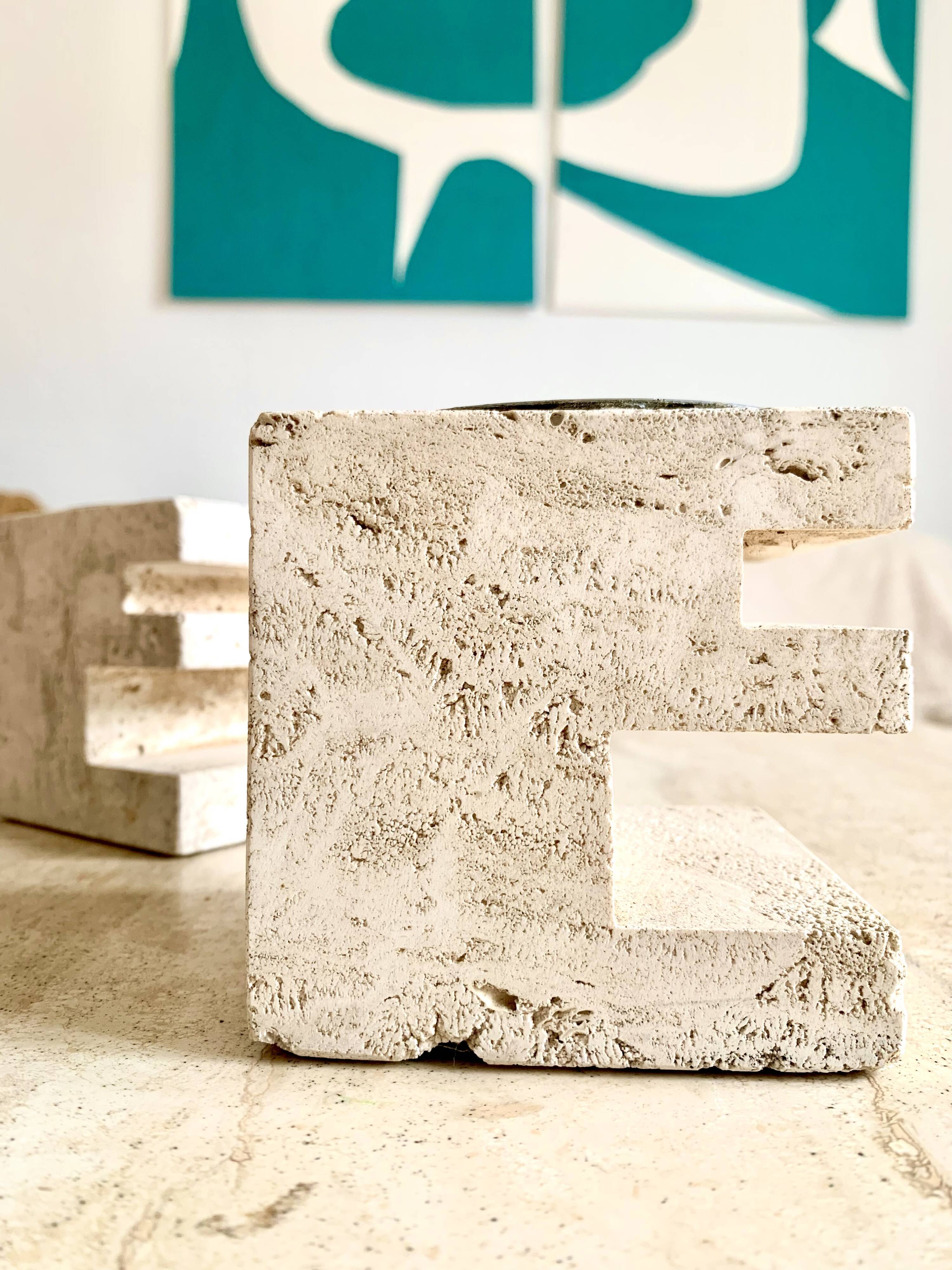 Pair of travertine candlesticks by Fratelli Mannelli, 1970