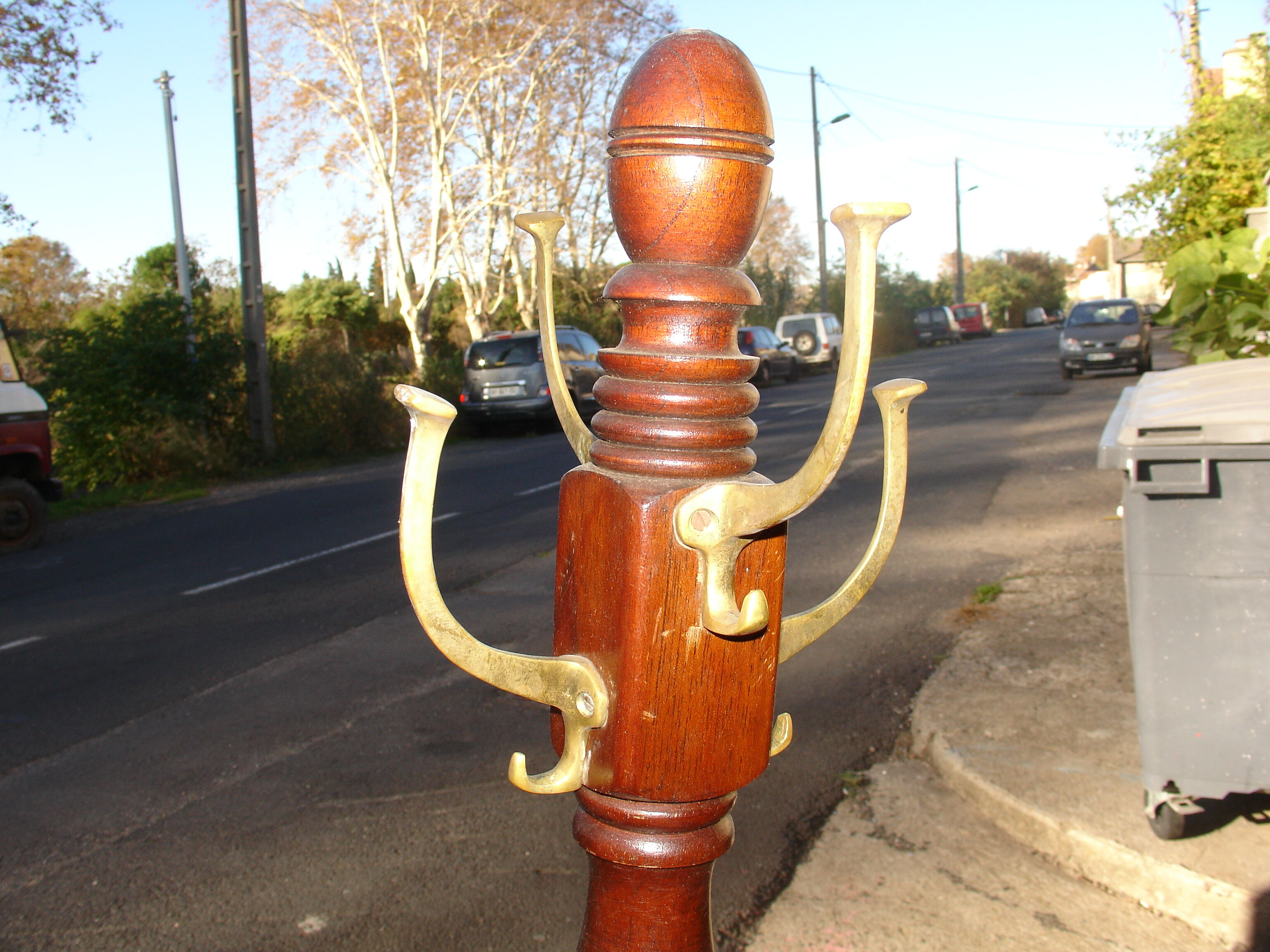 Coat rack known as "Parrot" in mahogany and bronze, circa 1950