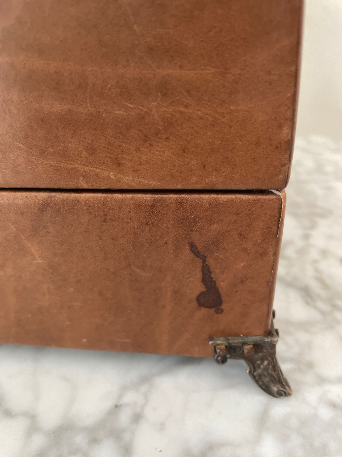 Vintage leather and silver metal jewelry box.