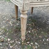 Antique armchair in Louis XVI style from the late 19th century.