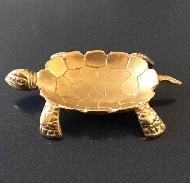 Empty turtle brass pouch
