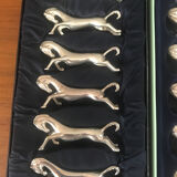 Set of 12 horses rests knives