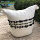 Pouf de sol en laine "a cheval"