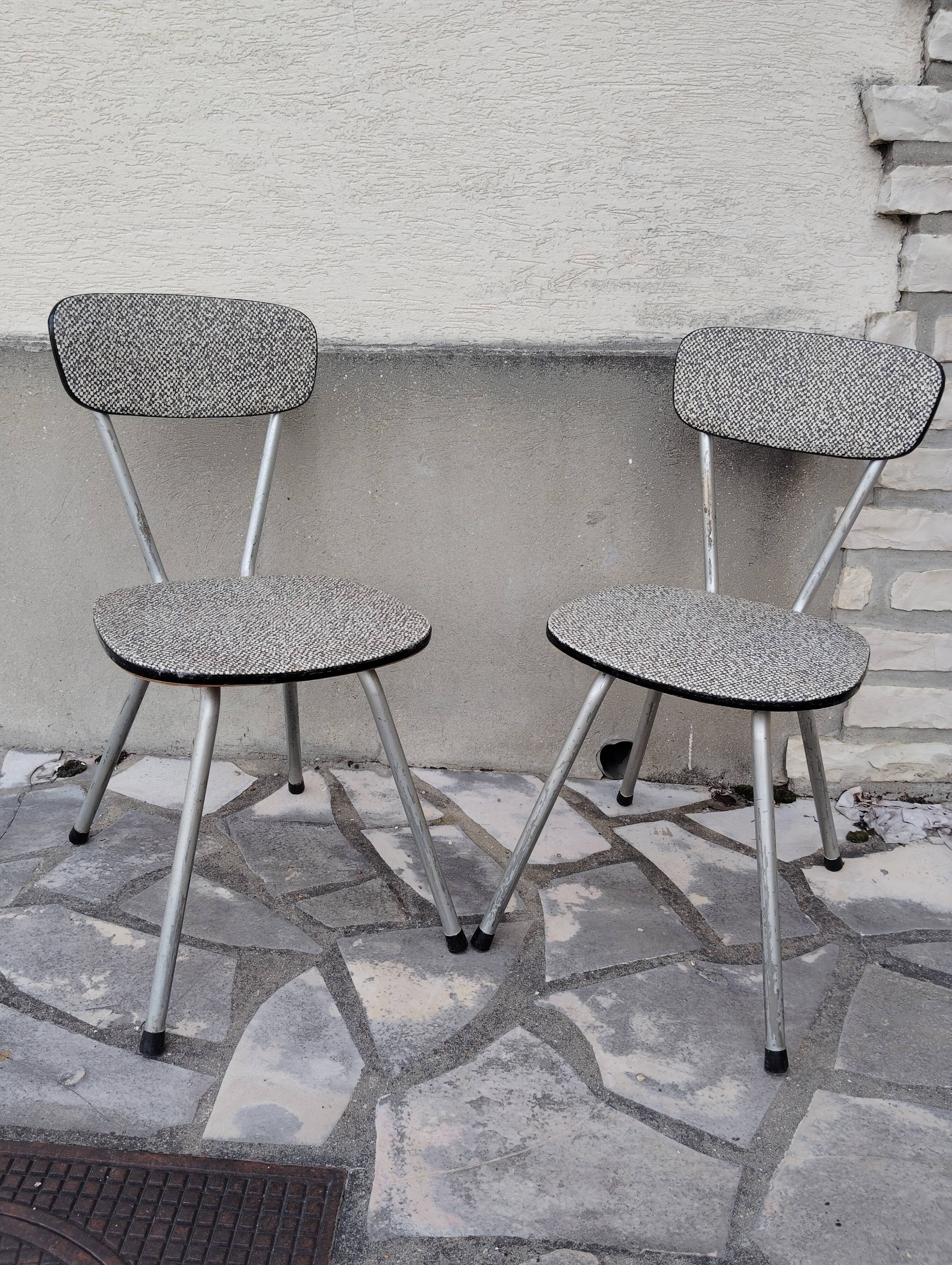 Pair of faux leather and metal chairs, 1950s-60s
