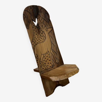 Chaise africaine à palabre en bois sculpté