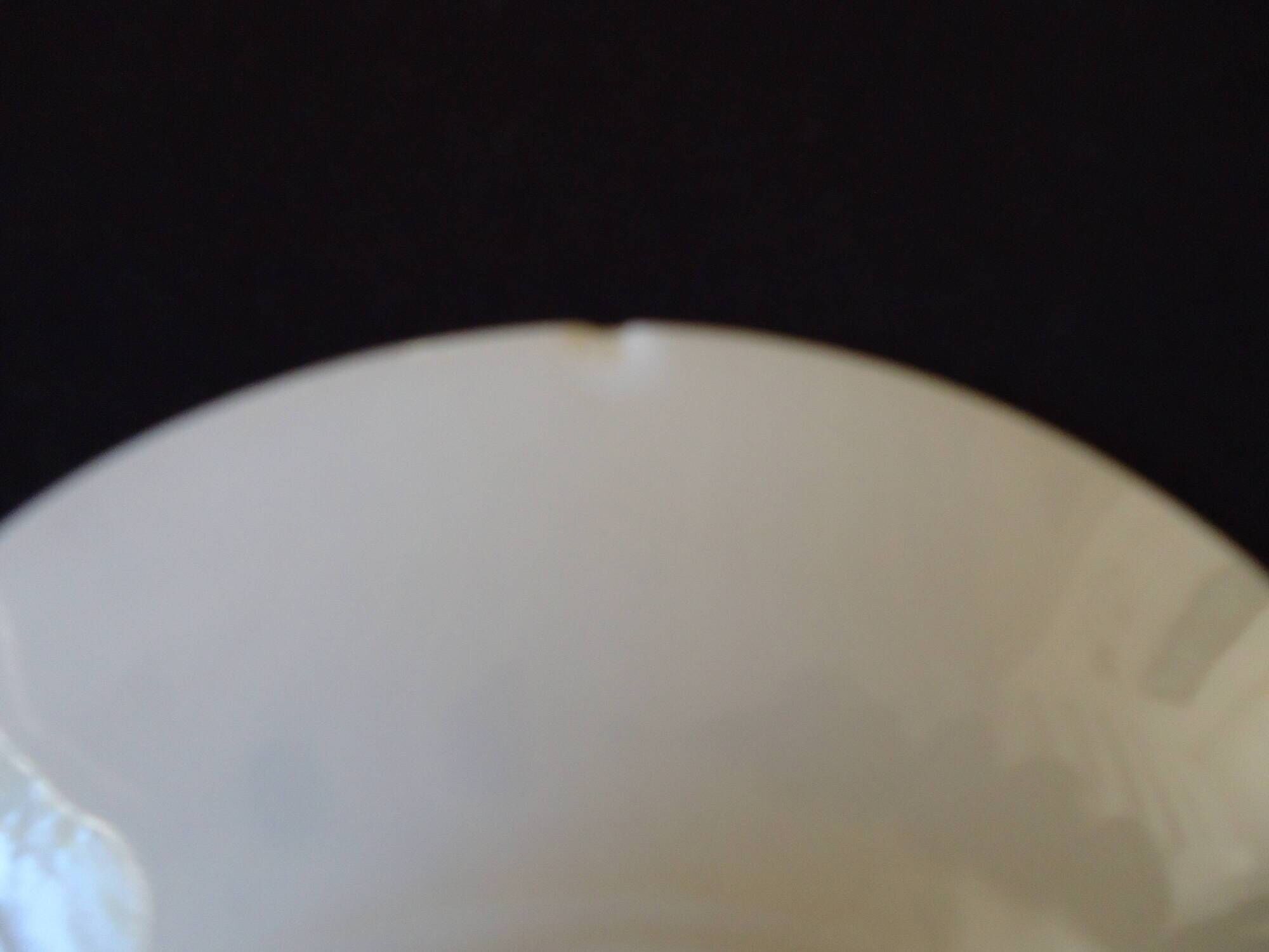 Set of six Art Deco white fine porcelain coffee cups and saucers