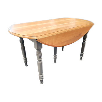 oval-shaped table in solid cherry tree