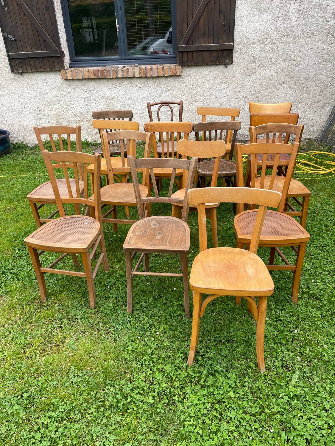 Lot of 16 mismatched bistro chairs