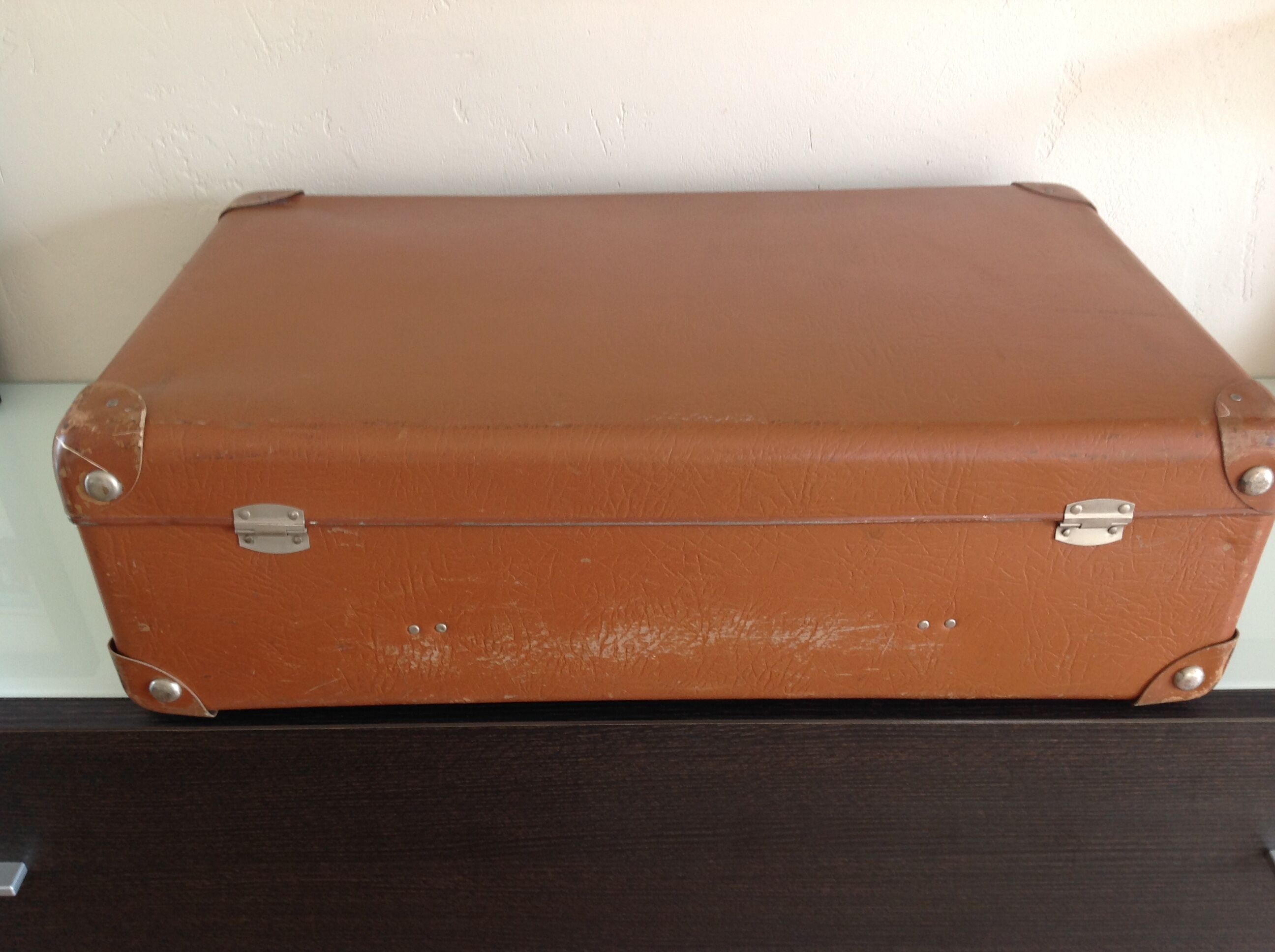 Light brown vintage suitcase