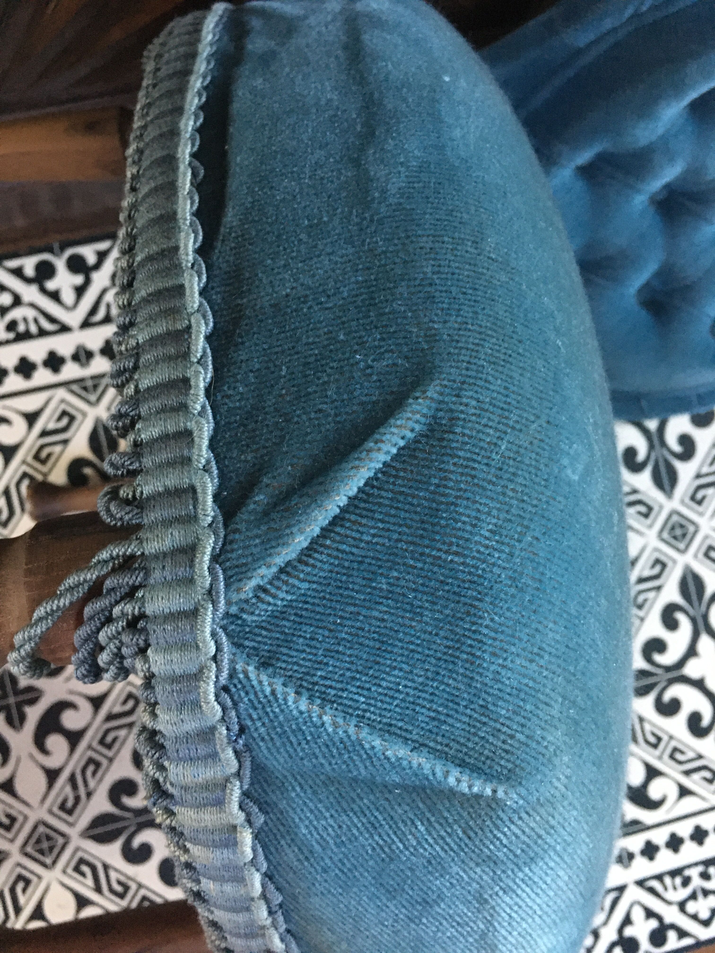 Blue heater with fringed medallion shape