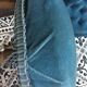 Blue heater with fringed medallion shape