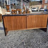 Vintage sideboard with sliding doors from the 60s