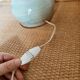 Table lamp in turned ceramic and wool