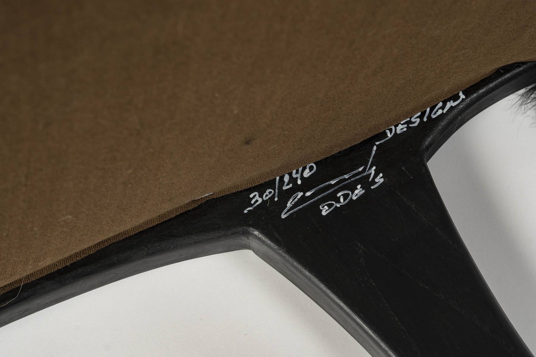 Pair of low chairs by olivier de schrijver