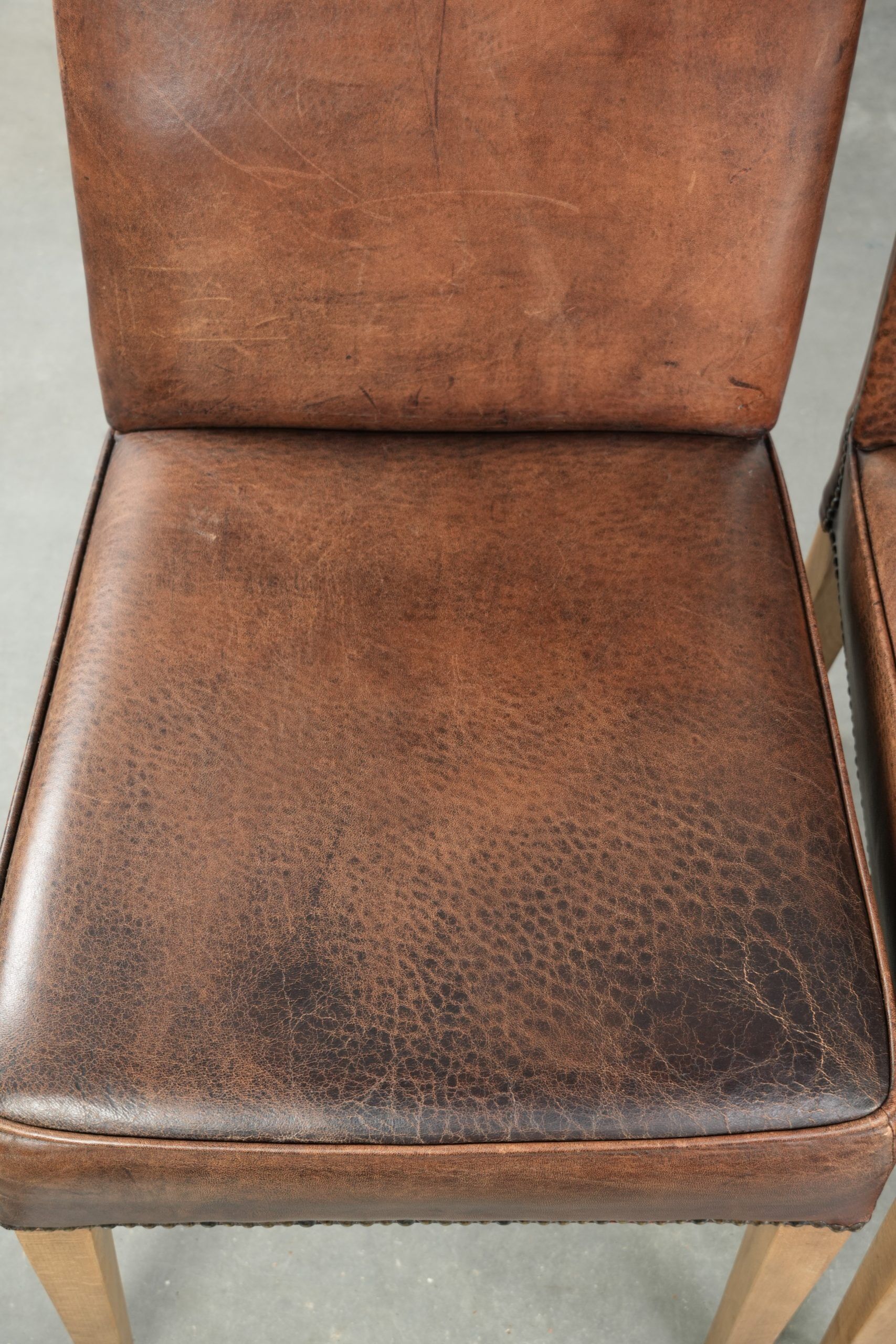 Vintage set of 4 dining chairs made of sheepskin leather with a high back