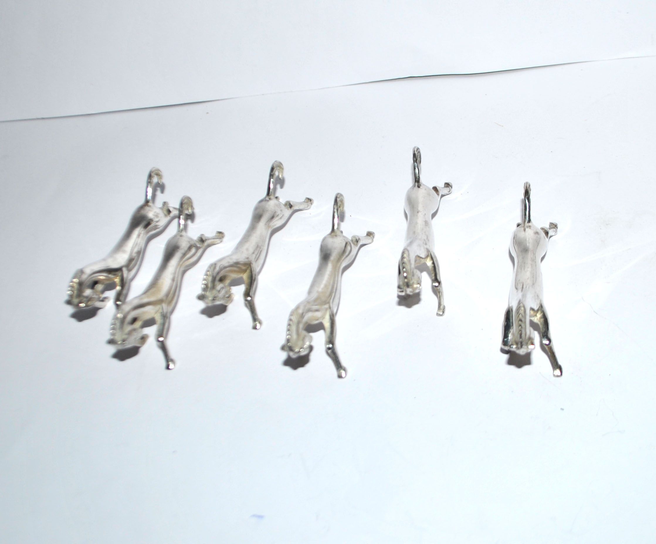 Set of 6 animal-shaped knife rests, modernist horse design in silver-plated metal, equestrian.