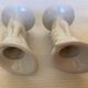 Paire de petits vases bougeoirs mains