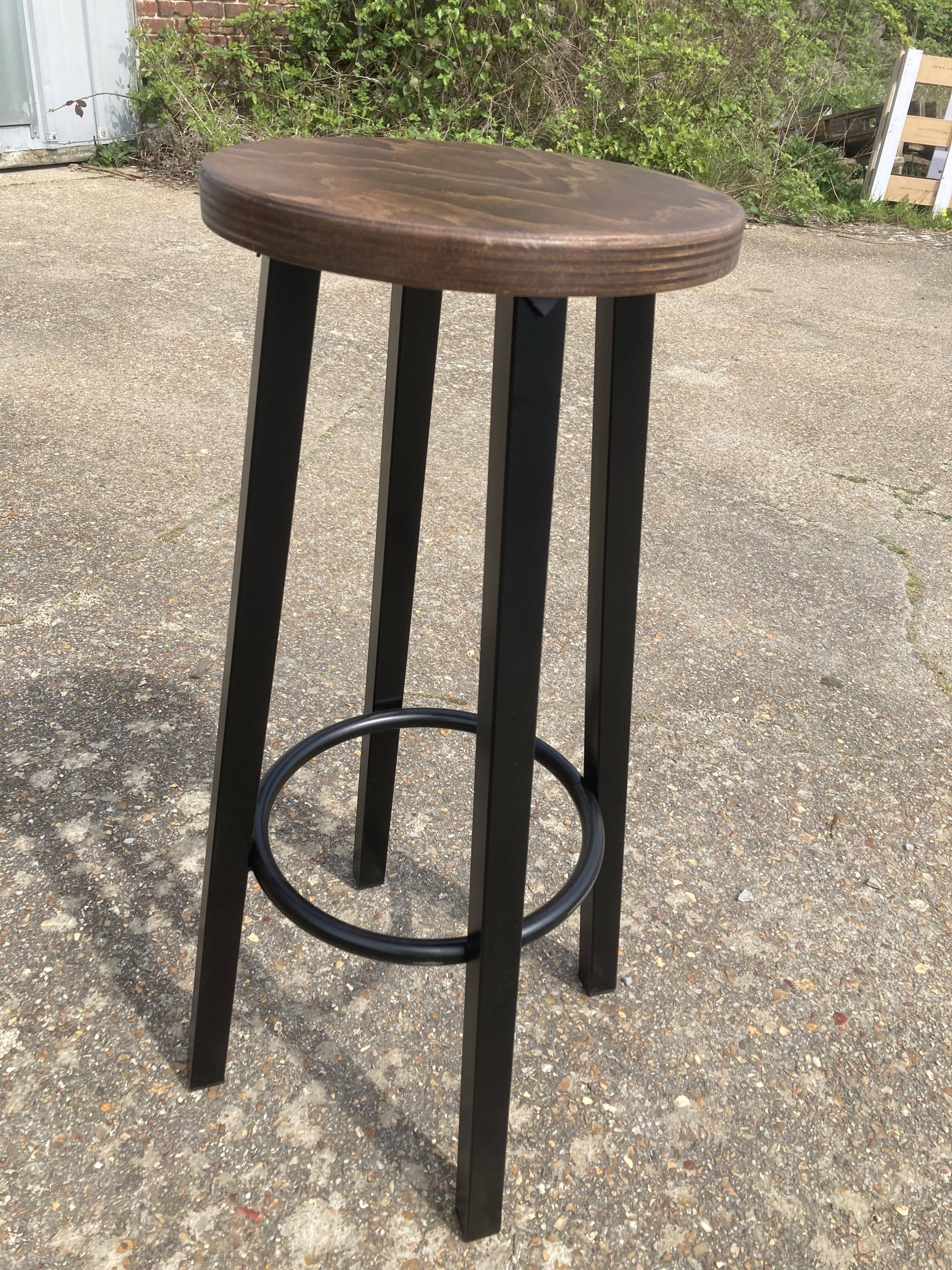 Set of 8 industrial bar stools.