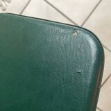 Pair of green faux leather chairs