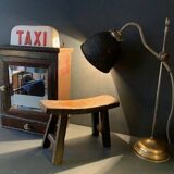 Antique milking stool in rustic curved wood, 19th century