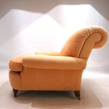 Deep seated armchair in the style of Howard & Sons