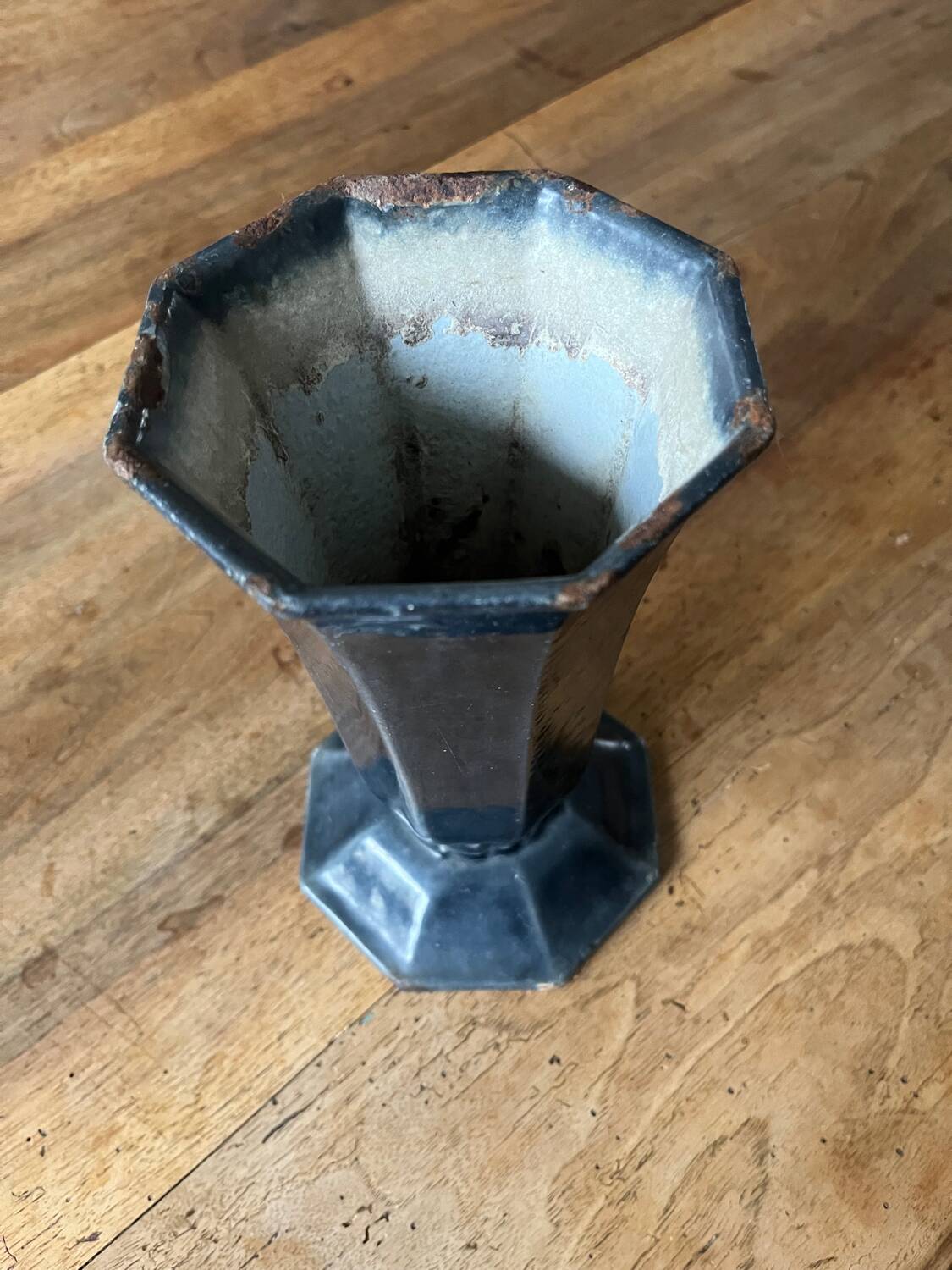 Antique enamelled cast iron vase