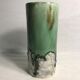 Roll old glazed ceramic vase green