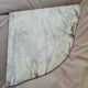 Golden wooden corner column and marble
