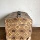 Domed chest in domino paper, 19th century.