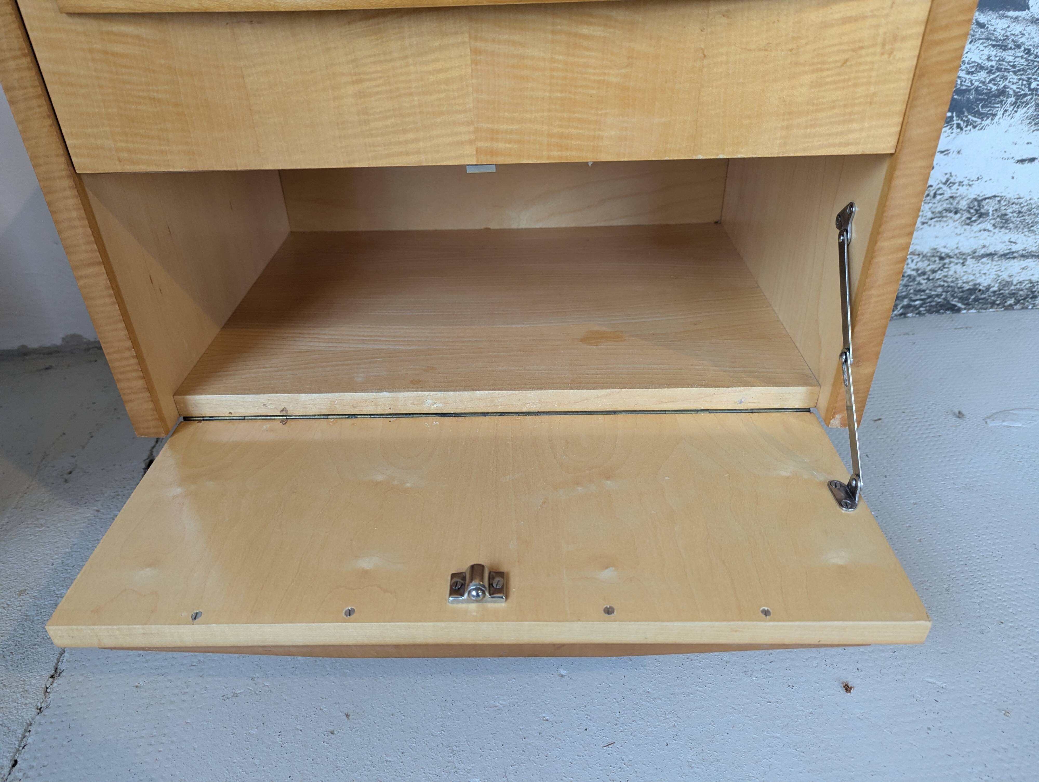 Pair of bedside tables in light wood