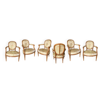 Suite de six fauteuils cabriolets en soie Louis XVI