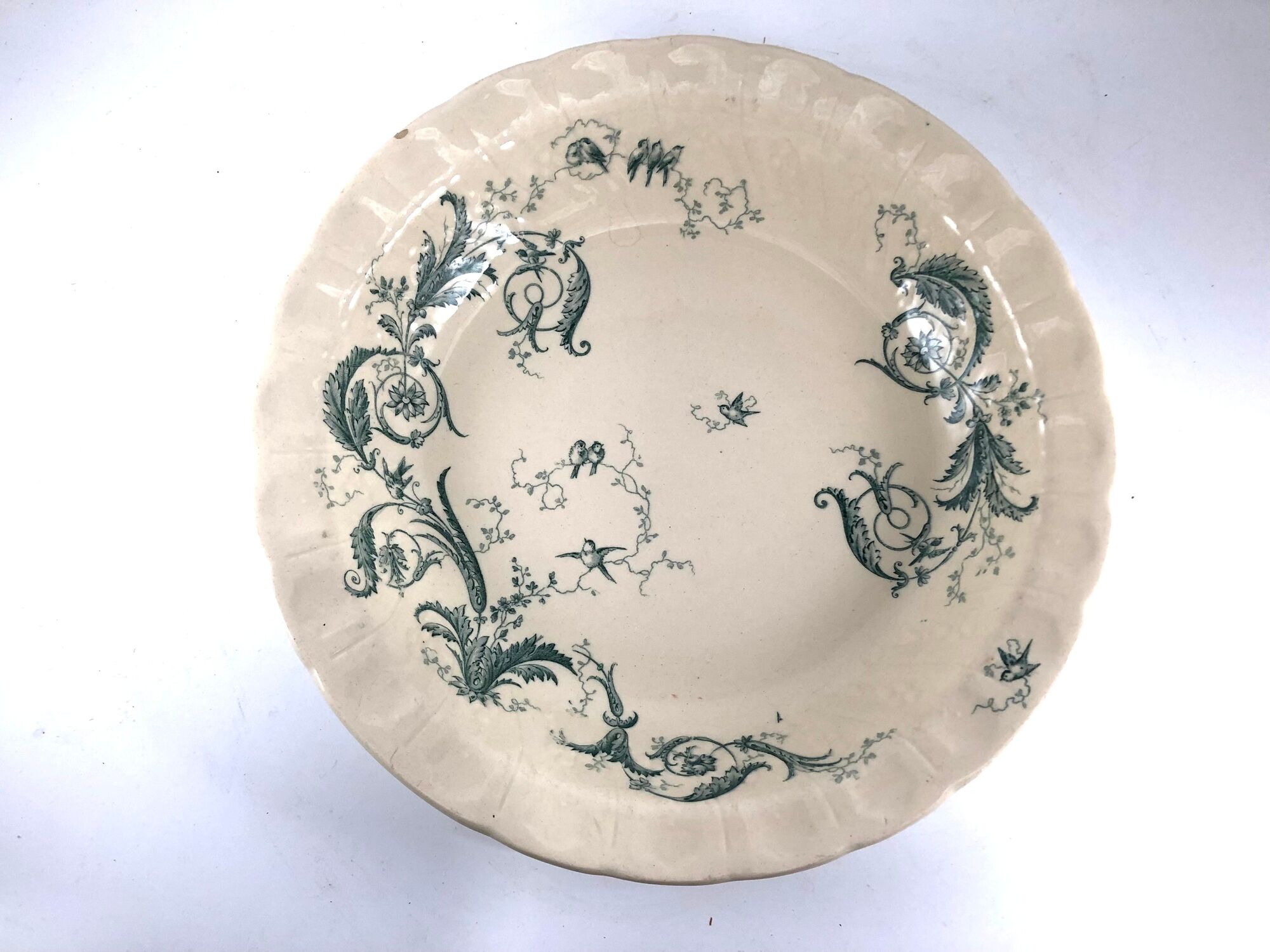 Hollow round plate in iron earth Gien model Rinceau