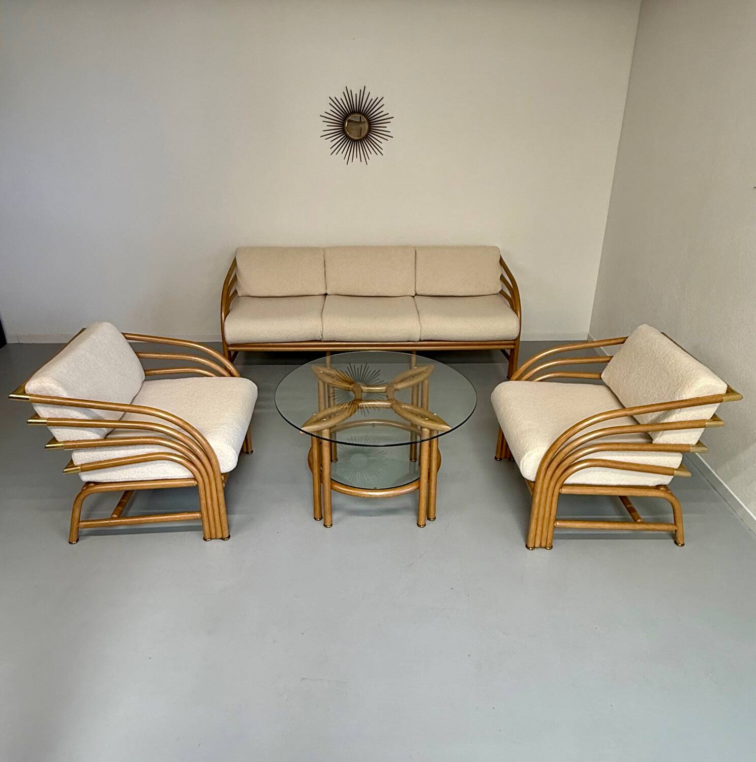 Complete living room with rattan sofa and white bouclette, brass finish, 80's design
