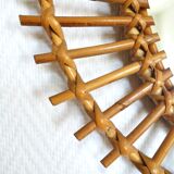 Free-form sun mirror in 60s rattan