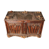 Furniture trunk in 19th tree covered with pine cones tree branches