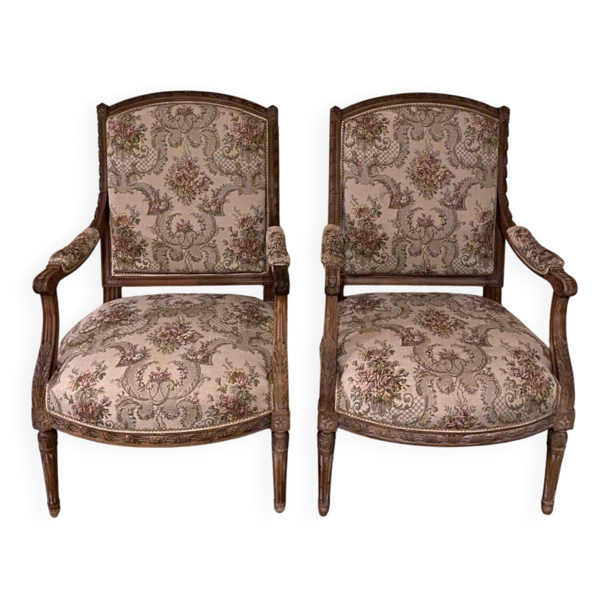 Pair of antique carved wooden armchairs