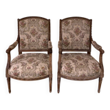 Pair of antique carved wooden armchairs