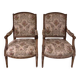Pair of antique carved wooden armchairs
