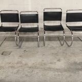 Set of 4 black leather chairs by Ludwig Mies Van Der Rohe