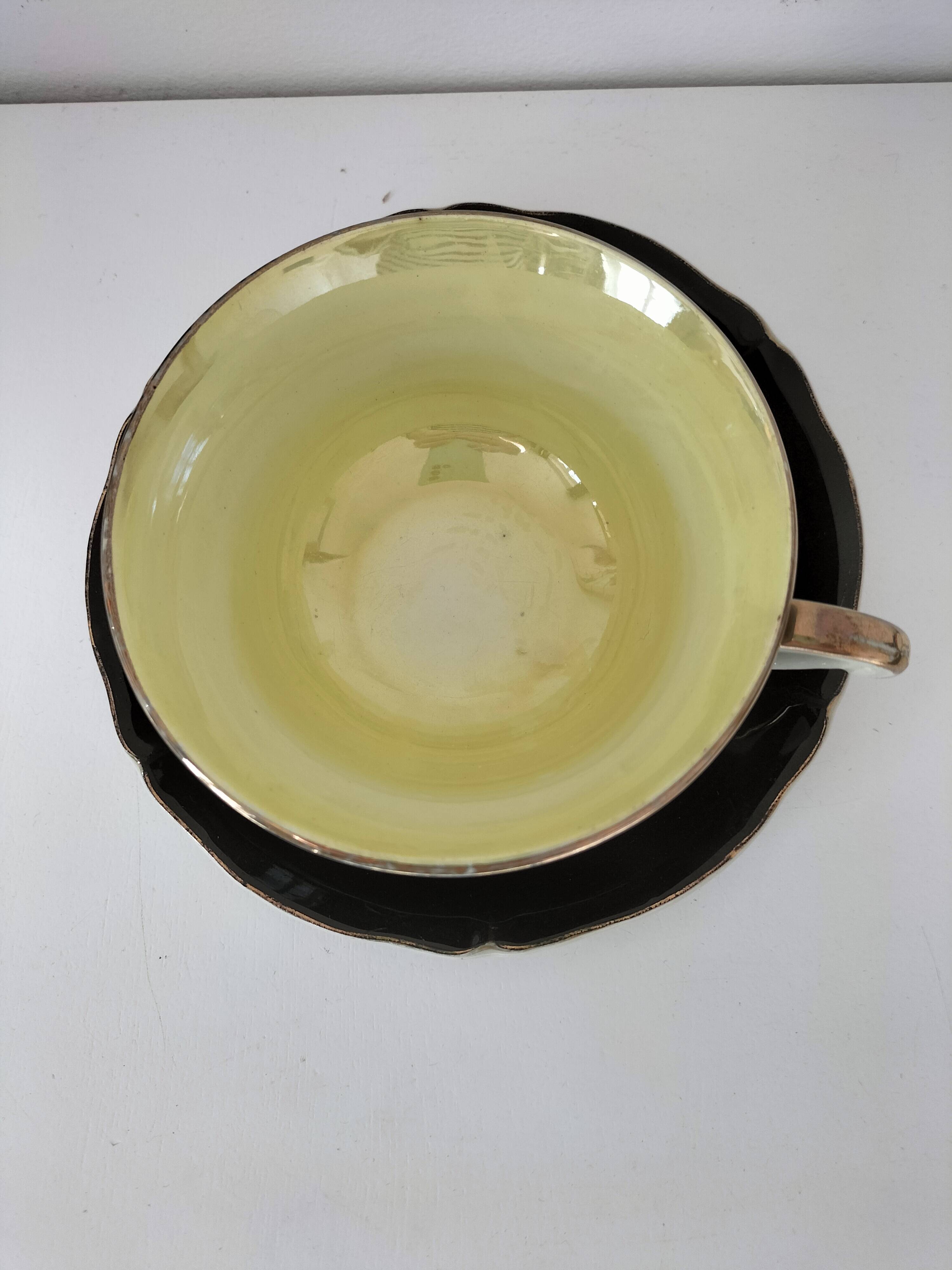 Large black, yellow iridescent and white Art Deco Saint-Amand cup.
