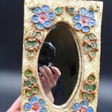 Flower-decorated sandstone mirror, circa 1970