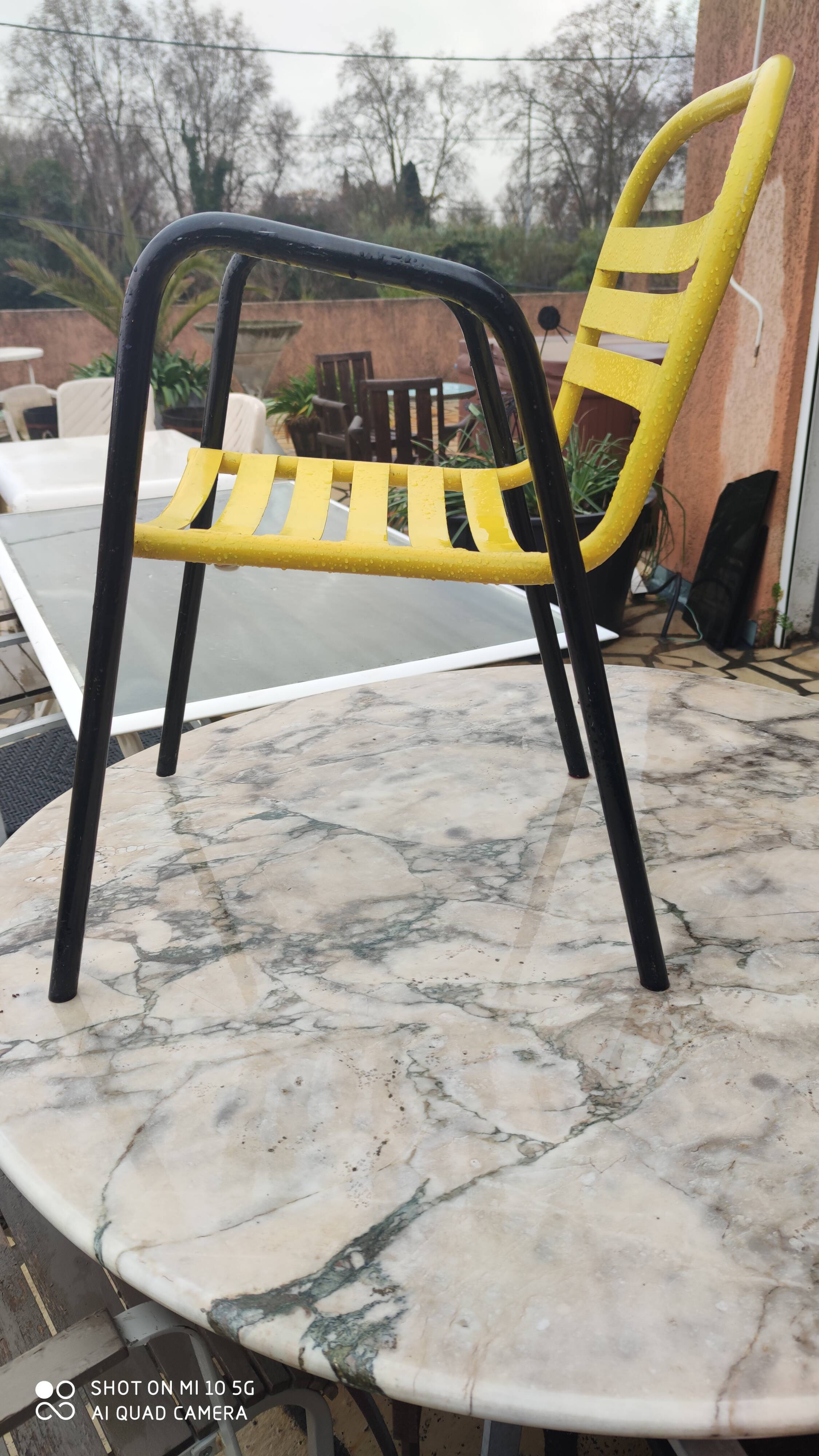 Armchair in black and yellow painted steel, circa 1950, in the style of Mallet-Stevens