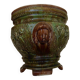 Old earthenware cachepot with woman decoration